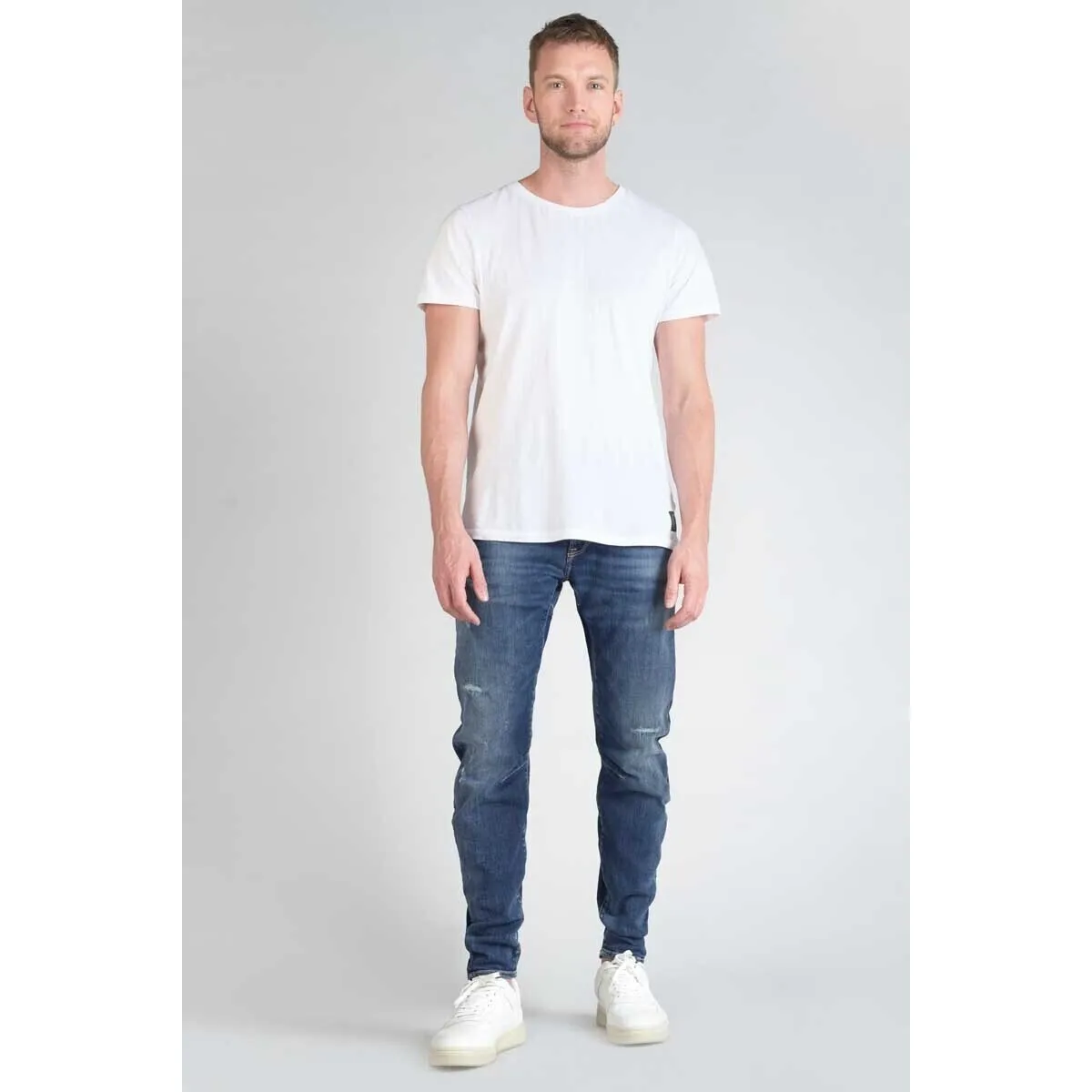 Jeans tapered , largo 34